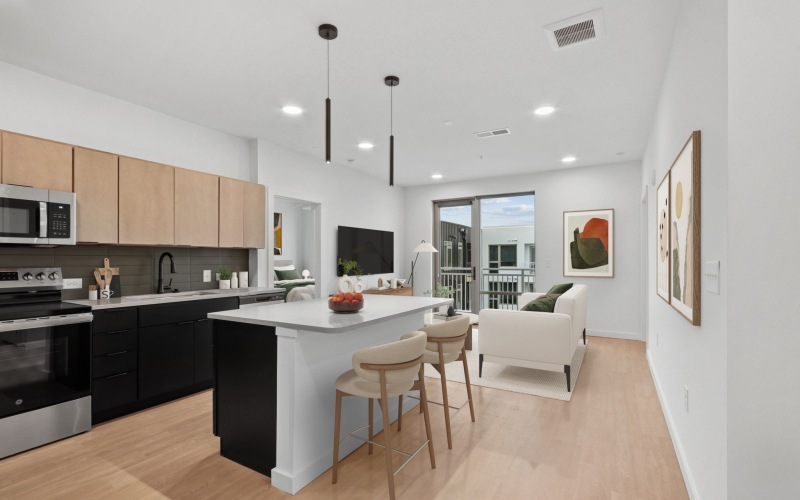 Natural light streams in the open concept kitchen floor plan