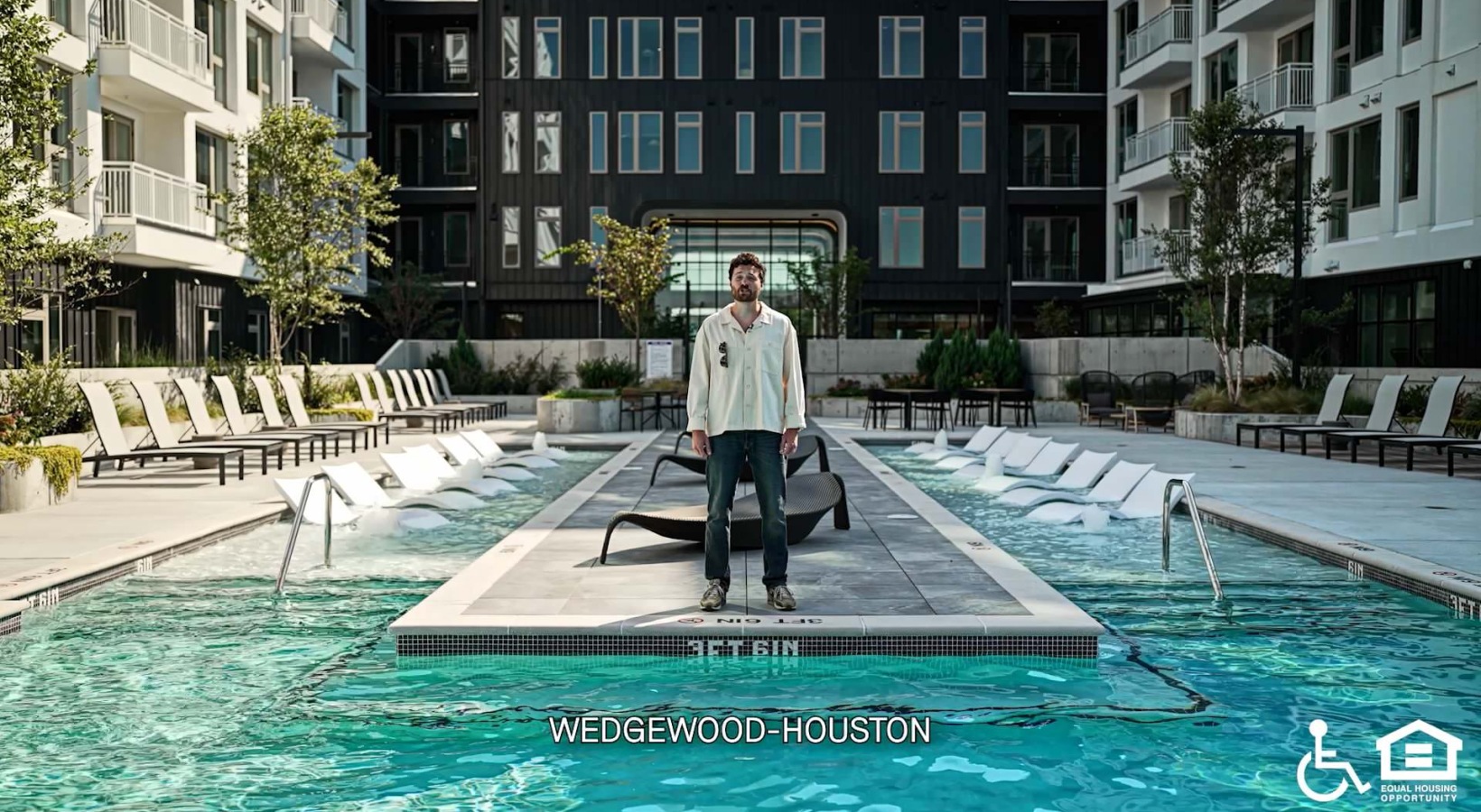 a person standing next to a pool