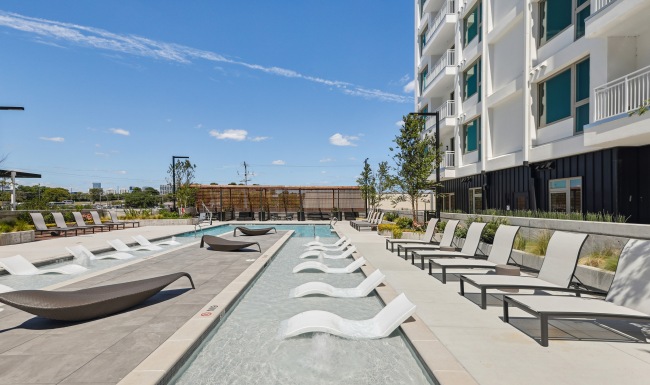 Westerly House outdoor pool with lounger chairs Westerly House outdoor pool with lounger chairs