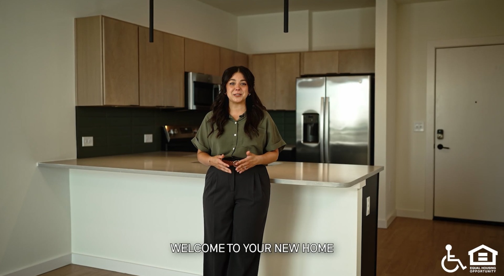 a person standing near a kitchen